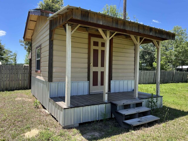 view of outdoor structure with a lawn