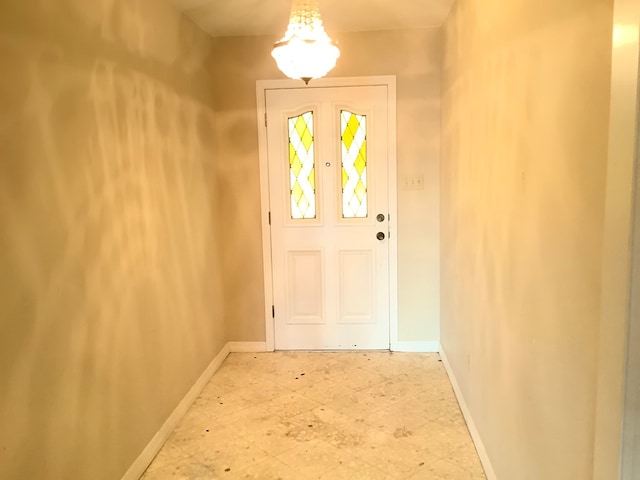 204 Primrose Ln, Hemphill, TX 75948 - doorway to outside featuring a chandelier and baseboards