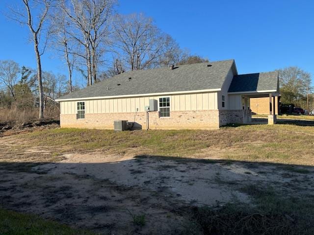 back of house with a yard