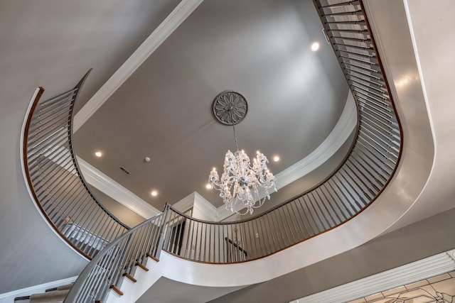 room details featuring a chandelier, tile flooring, and ornamental molding