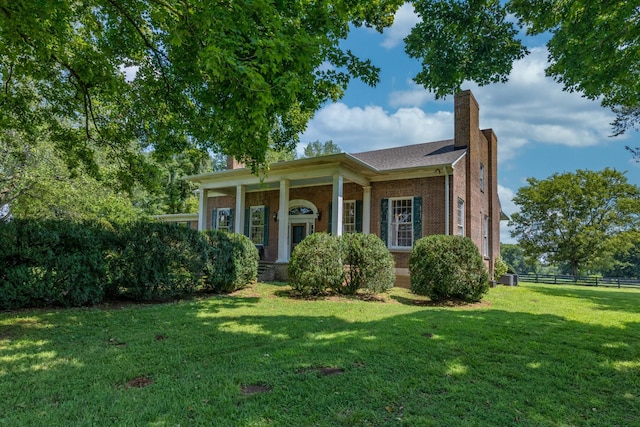 view of front of house with a front yard