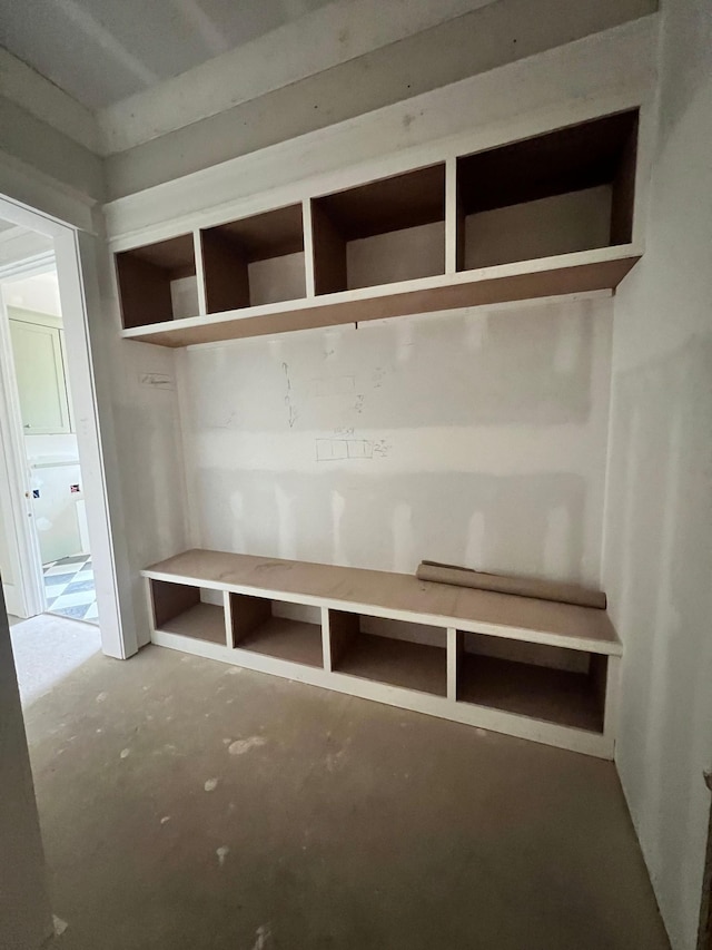 mudroom featuring concrete floors