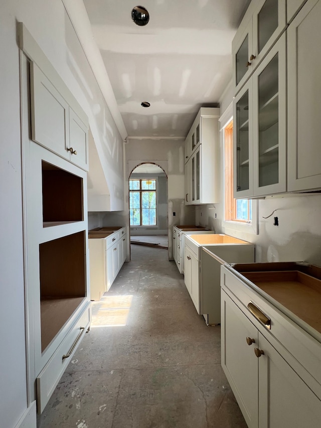 kitchen featuring white cabinets