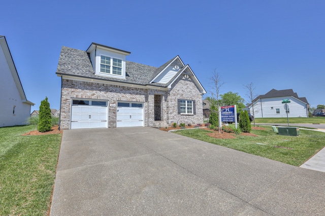 view of front facade featuring a garage and a front yard