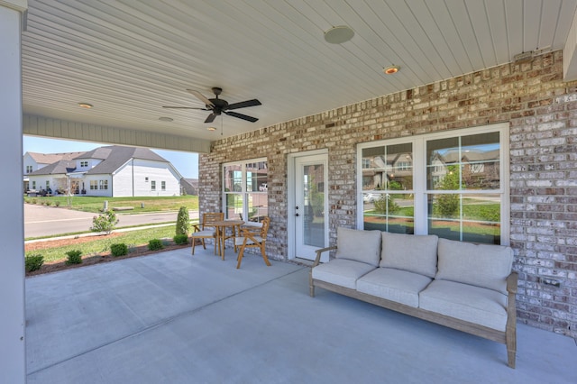 view of patio / terrace with french doors and ceiling fan