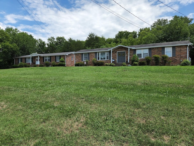 ranch-style house with a front lawn