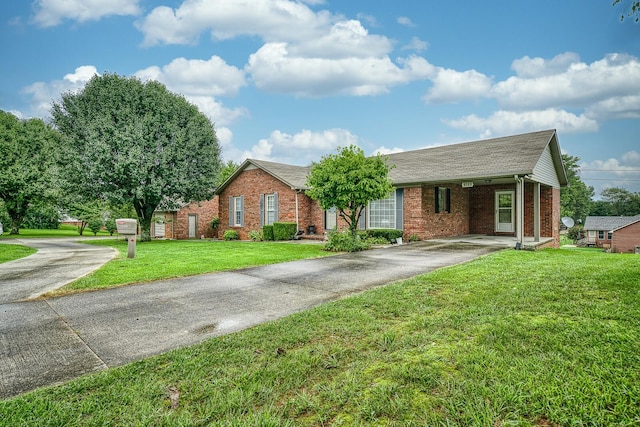 ranch-style house featuring a front lawn