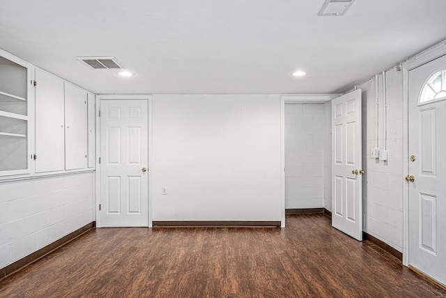 interior space with dark wood-type flooring