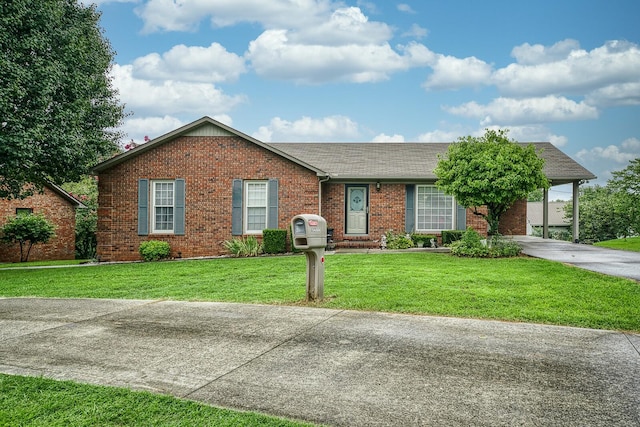 single story home featuring a front lawn and a garage