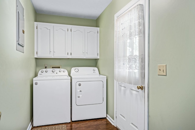 clothes washing area featuring washing machine and clothes dryer, cabinets, washer hookup, and dark hardwood / wood-style flooring