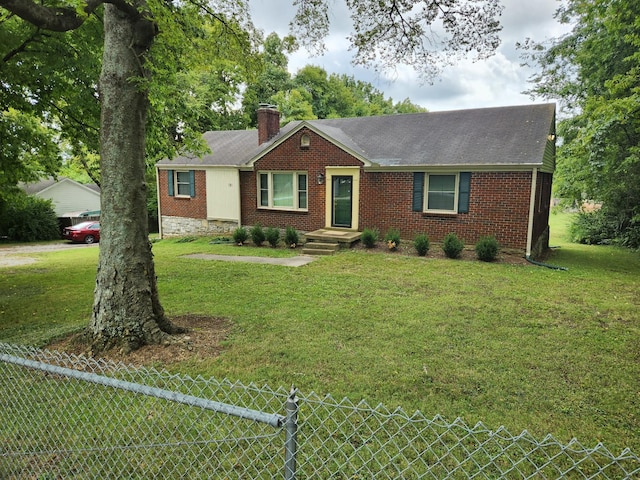 single story home with a front yard