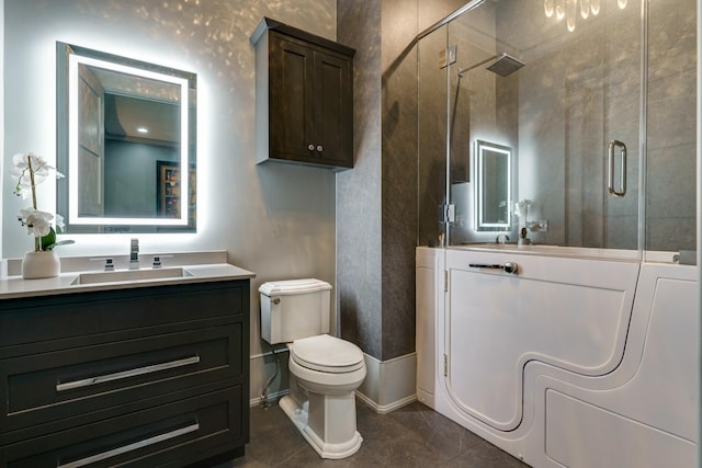 bathroom with tile flooring, a shower with door, toilet, and vanity