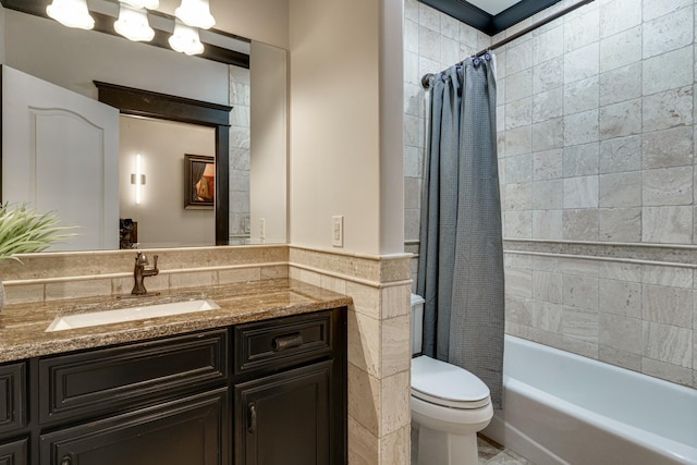 full bathroom with toilet, shower / bath combo with shower curtain, and vanity