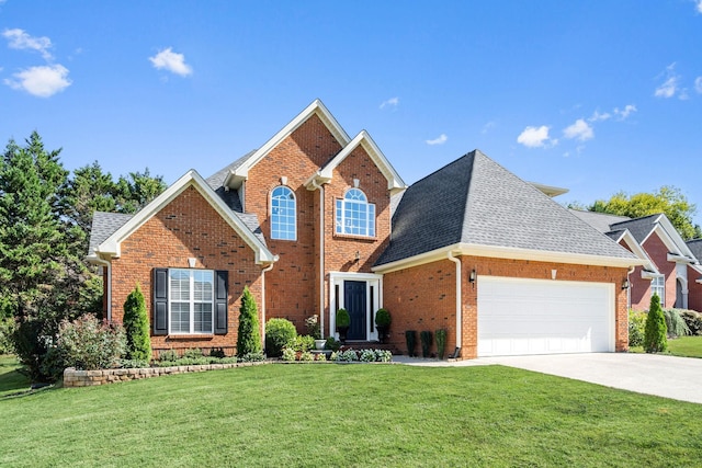 front facade with a front lawn and a garage