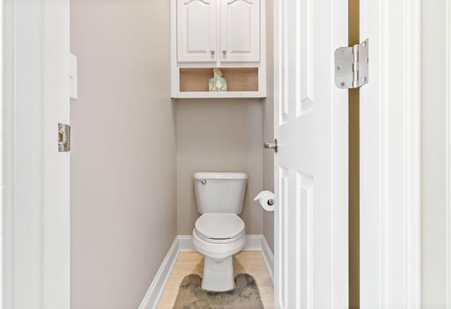 bathroom featuring toilet