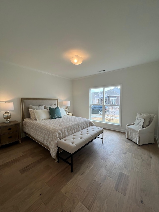 bedroom featuring hardwood / wood-style flooring