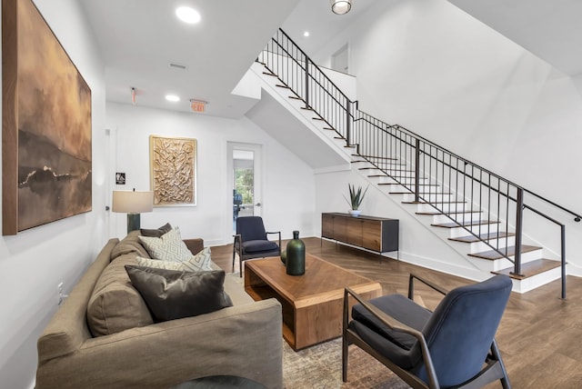 living room featuring visible vents, recessed lighting, stairway, wood finished floors, and baseboards