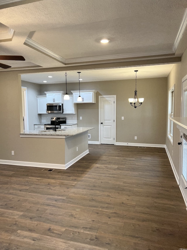 kitchen with white cabinetry and dark hardwood / wood-style floors