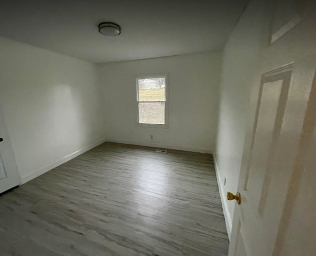 interior space with hardwood / wood-style flooring