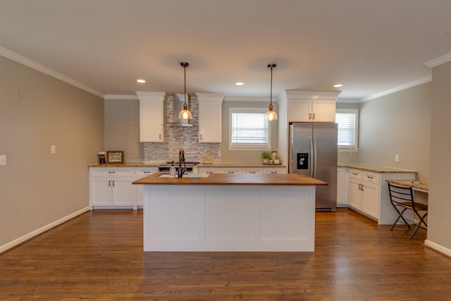 kitchen with white cabinets, stainless steel fridge with ice dispenser, dark wood-type flooring, and a center island with sink