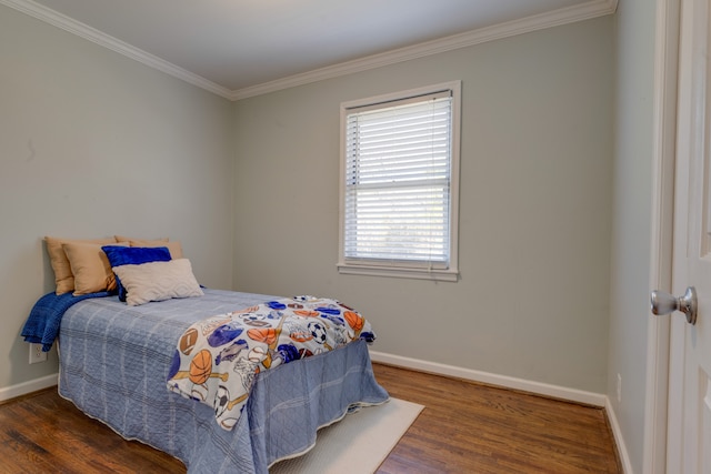 bedroom with crown molding and dark wood-type flooring