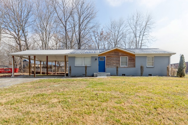 view of front facade featuring a front lawn and a carport