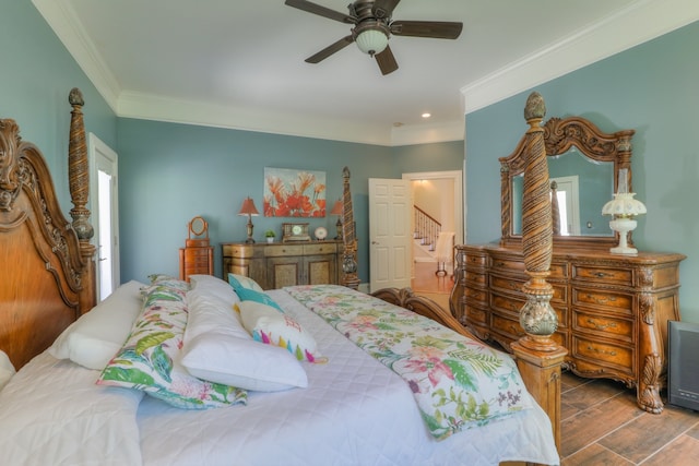 bedroom with multiple windows, ornamental molding, ceiling fan, and wood-type flooring