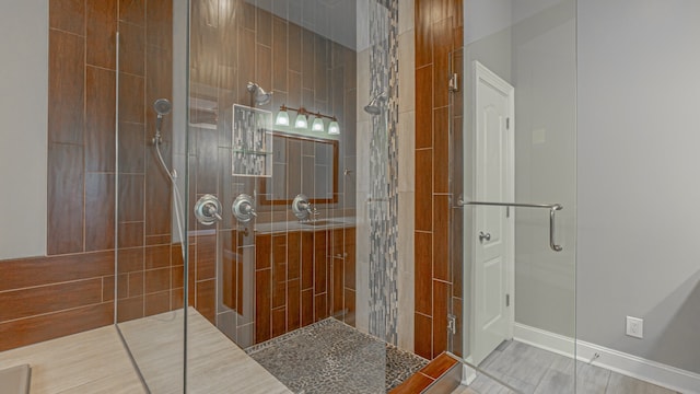 bathroom featuring tile floors and walk in shower