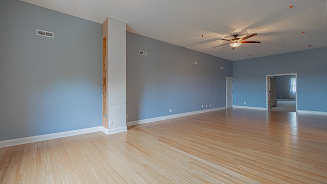 unfurnished room featuring ceiling fan and light wood-type flooring