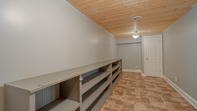 spacious closet featuring light tile floors