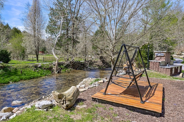 view of yard with a wooden deck