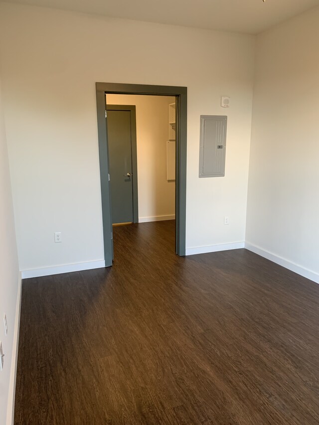 1900 12th Ave S Unit 313, Nashville, TN 37203 - empty room featuring dark hardwood / wood-style floors