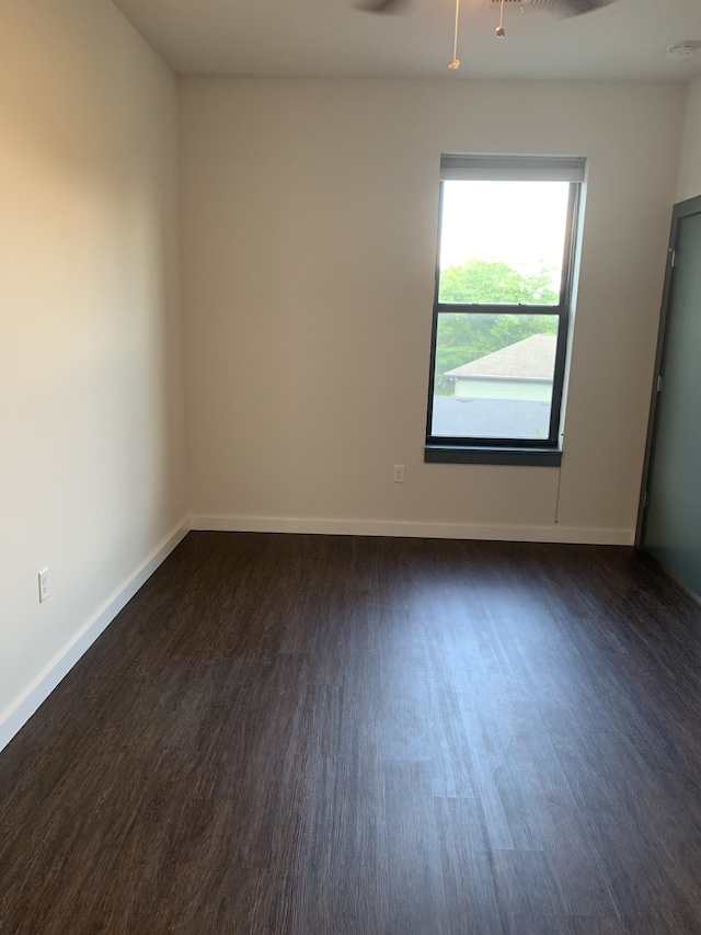 1900 12th Ave S Unit 313, Nashville, TN 37203 - spare room featuring dark hardwood / wood-style floors and ceiling fan