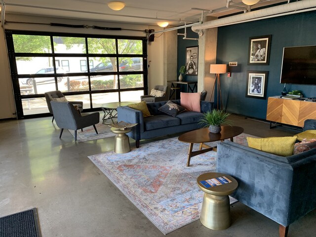 1900 12th Ave S Unit 313, Nashville, TN 37203 - living room featuring a healthy amount of sunlight