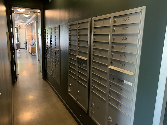 1900 12th Ave S Unit 313, Nashville, TN 37203 - corridor featuring concrete flooring and a mail area