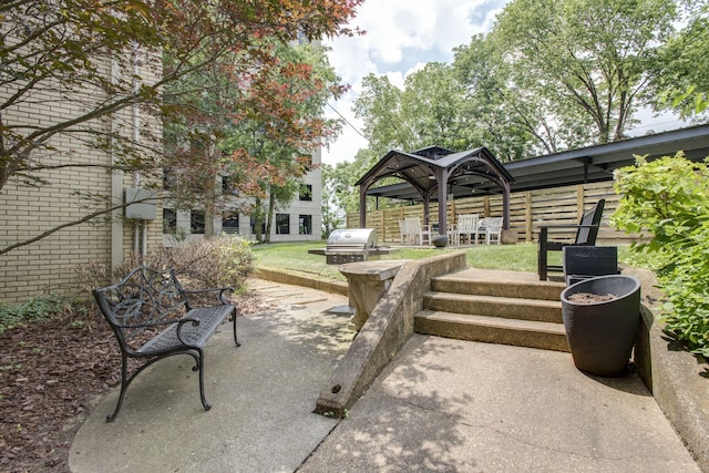 exterior space featuring a gazebo and a patio area