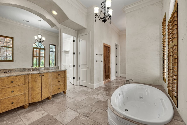 bathroom with vanity, crown molding, and a notable chandelier