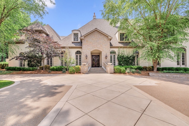 french provincial home with french doors