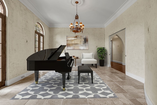 miscellaneous room featuring a chandelier and ornamental molding