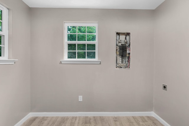 empty room with hardwood / wood-style flooring