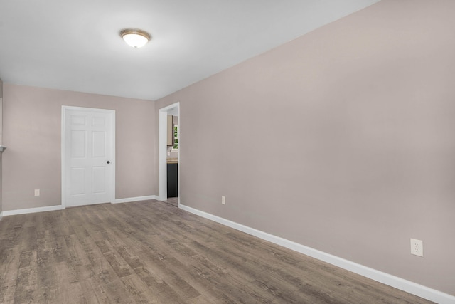 empty room featuring hardwood / wood-style floors