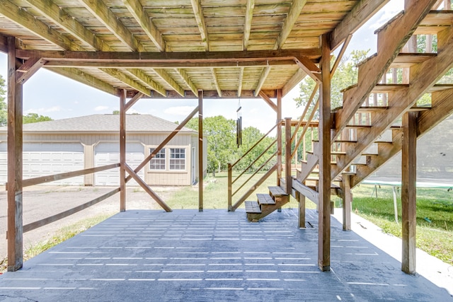 exterior space with an outdoor structure and a garage