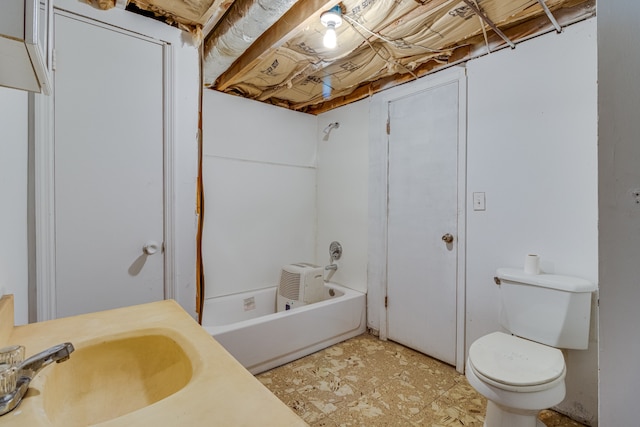 full bathroom with shower / tub combination, tile floors, toilet, and sink