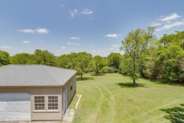 view of yard featuring a garage