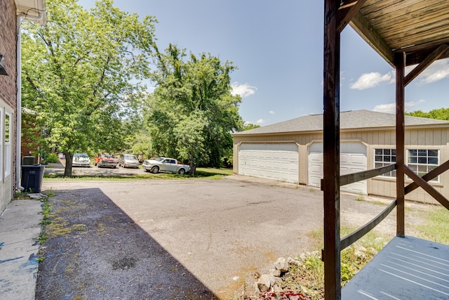 view of yard featuring a garage