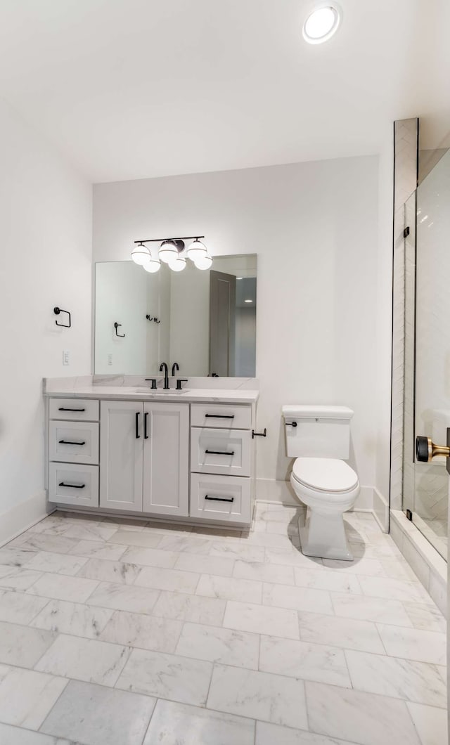 bathroom with vanity, tile flooring, a shower with door, and toilet