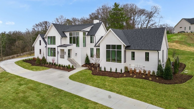 view of front of house with a front lawn