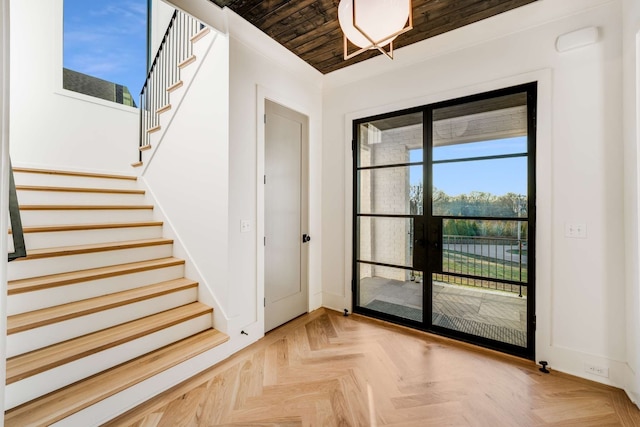 interior space featuring light parquet floors and wooden ceiling