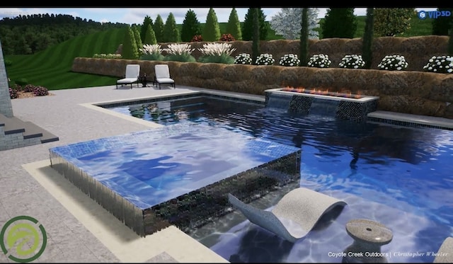 view of pool with a patio area and pool water feature