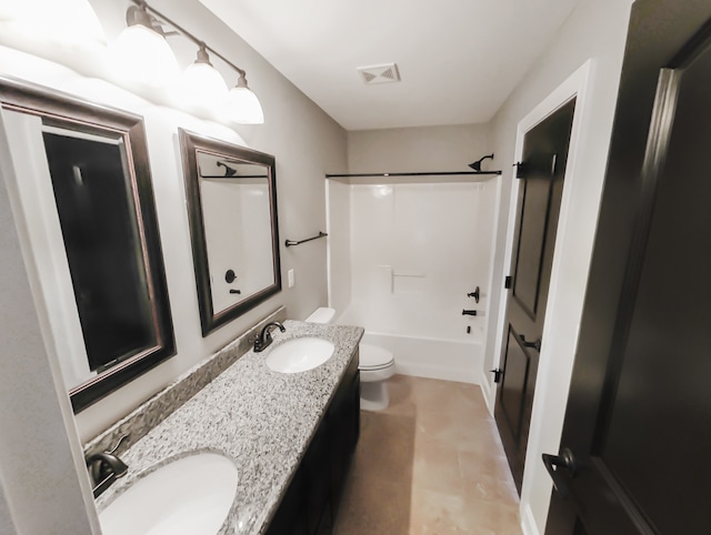 full bathroom featuring tile floors, toilet, double vanity, and shower / bathing tub combination